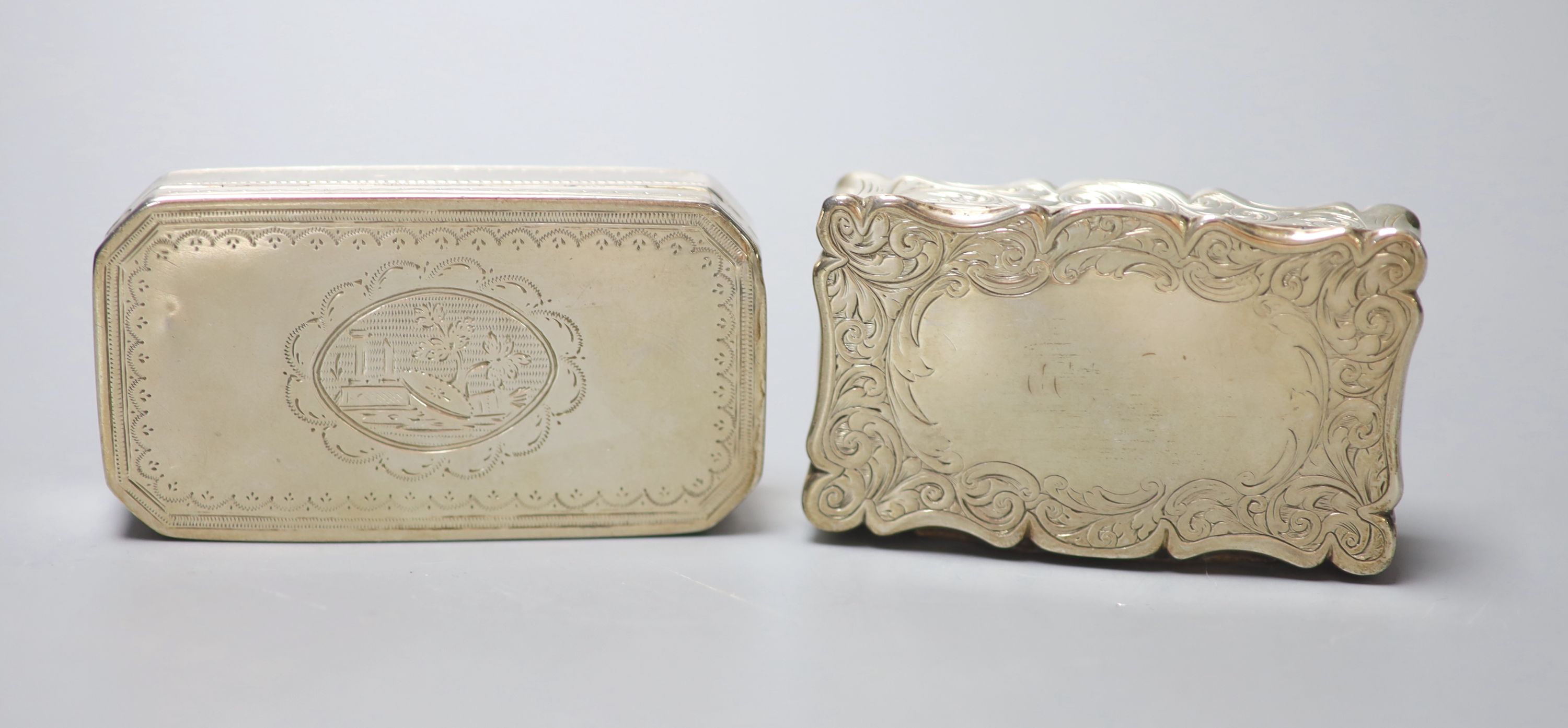 An early 19th century French engraved 950 standard octagonal snuff box, 84mm and a Victorian silver snuff box, Birmingham, 1852.